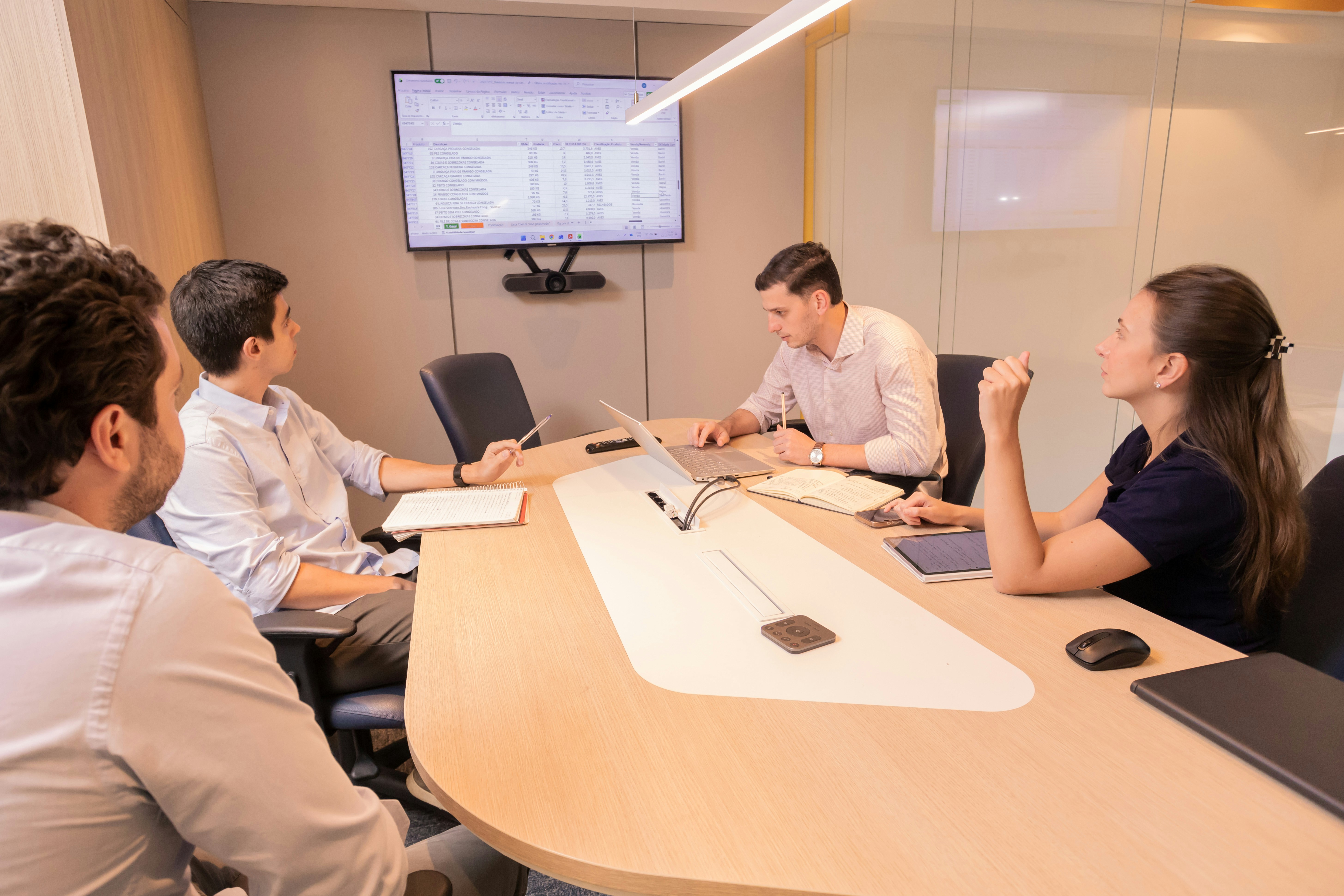 Colleagues discussing a media plan